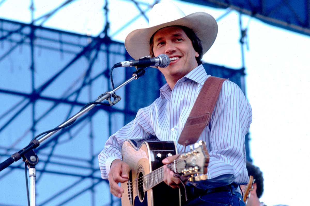 American Country musician George Strait plays guitar as he performs onstage at Chicagofest, Chicago, Illinois, August 30, 1985.