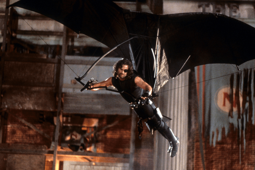 Kurt Russell hang-gliding in a scene from the film 'Escape From L.A.', 1996