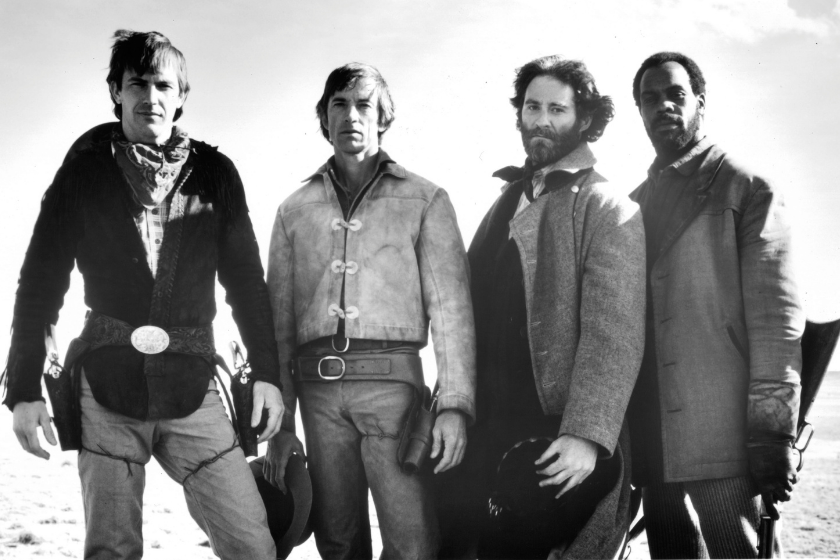 CIRCA 1985: Actors Kevin Costner, Scott Glenn, Kevin Kline and Danny Glover on set the movie "Silverado" circa 1985