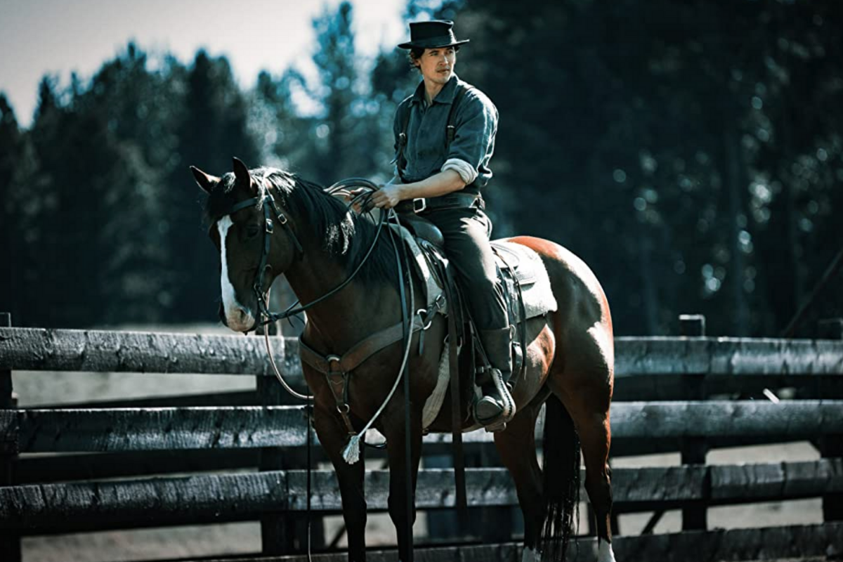 Tom Blythe on a horse in a scene from 'Billy the Kid'