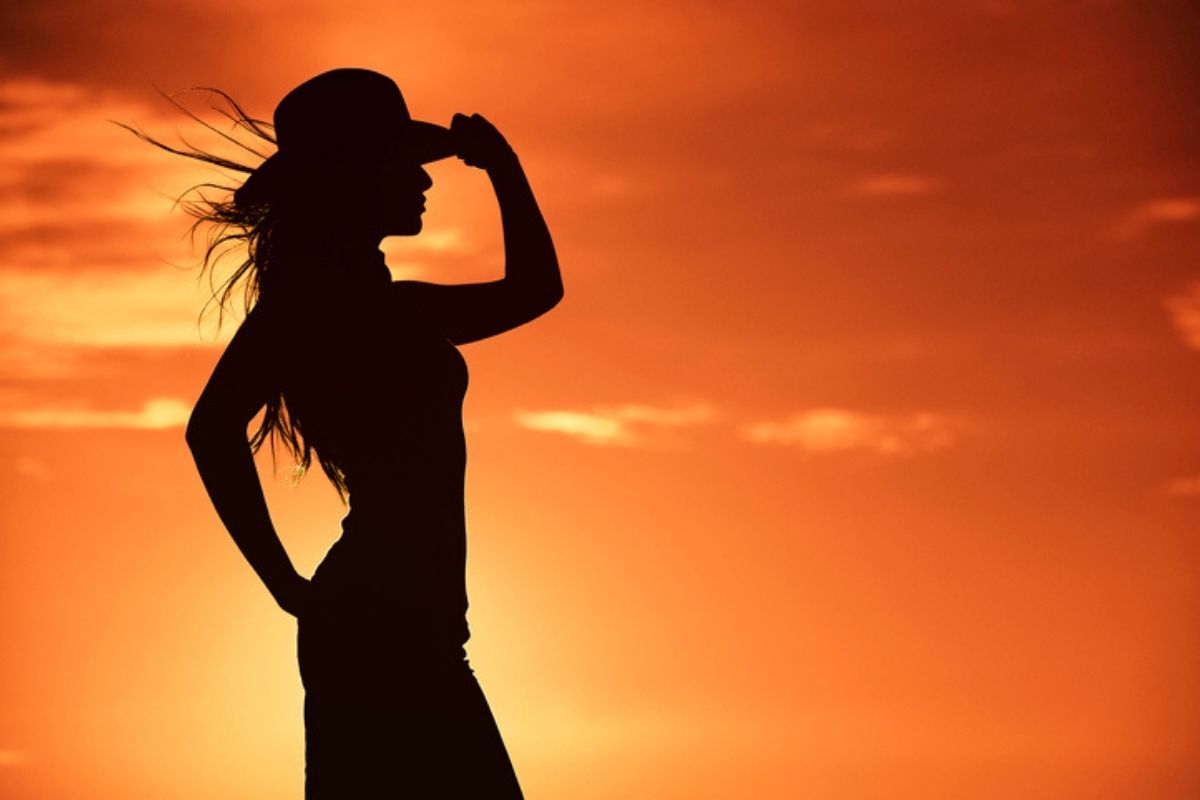 woman wearing hat on ranch