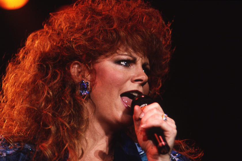 NASHVILLE -August 24: Country Music Singer Songwriter Reba McEntire preforms on August 24, 1990 Nashville, Tennessee 