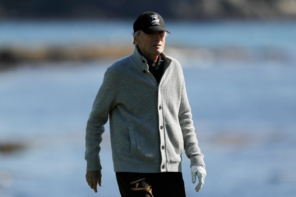 Actor Clint Eastwood looks on from the 18th hole during the 3M Celebrity Challenge prior to the AT&T Pebble Beach Pro-Am at Pebble Beach Golf Links on February 05, 2020 in Pebble Beach, California.