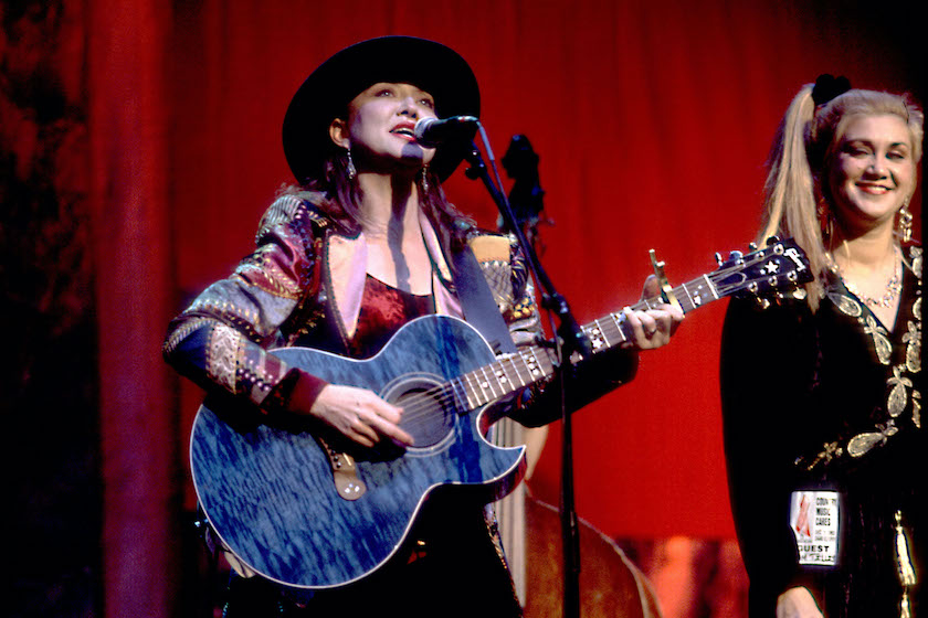 Pam Tillis (left) performs onstage, Nashville, Tennessee, December 1, 1993. 