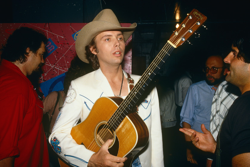 LOS ANGELES, CA - 1987: Country music singer Dwight Yoakam waits to take the stage at a 1987 Los Angeles, California, concert. Yoakam has starred in numerous films including, "Sling Blade" and "The Panic Room." 