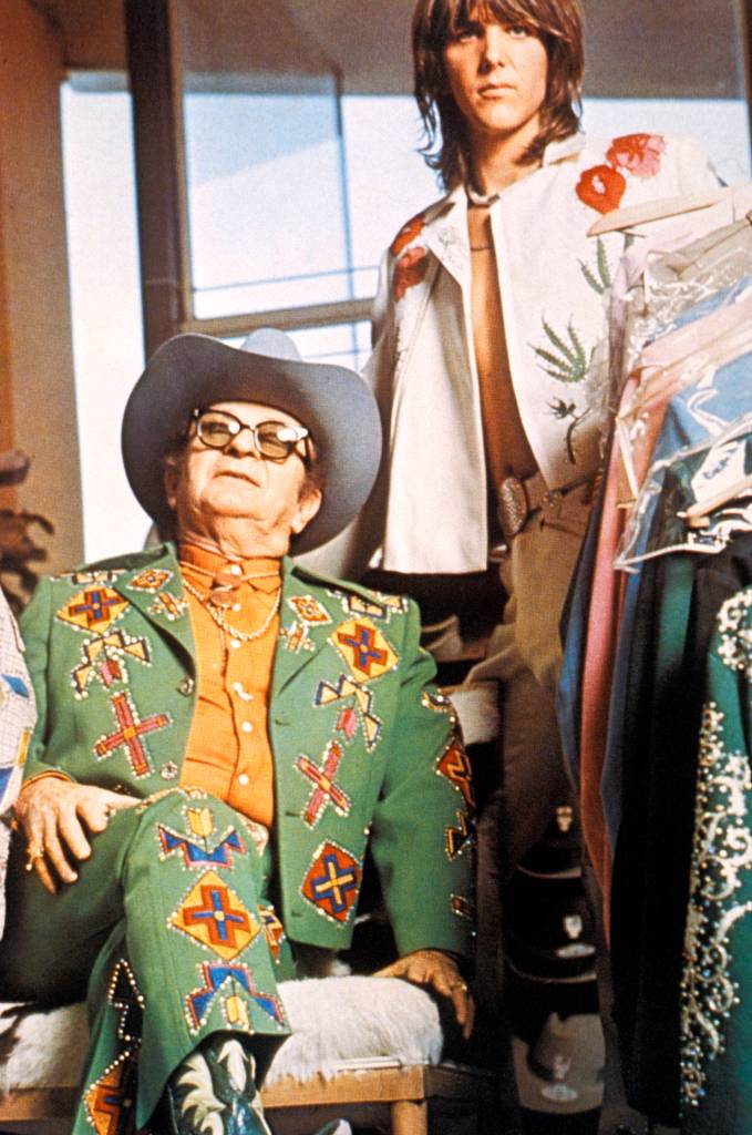 Nudie Cohn and Gram Parsons posed together circa 1969.