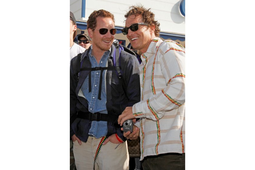 Actors Cole Hauser and Matthew McConaughey attend MaliBLUE Art & Music festival, sponsored by Emergen-C, held at the Malibu Pier in Malibu, California