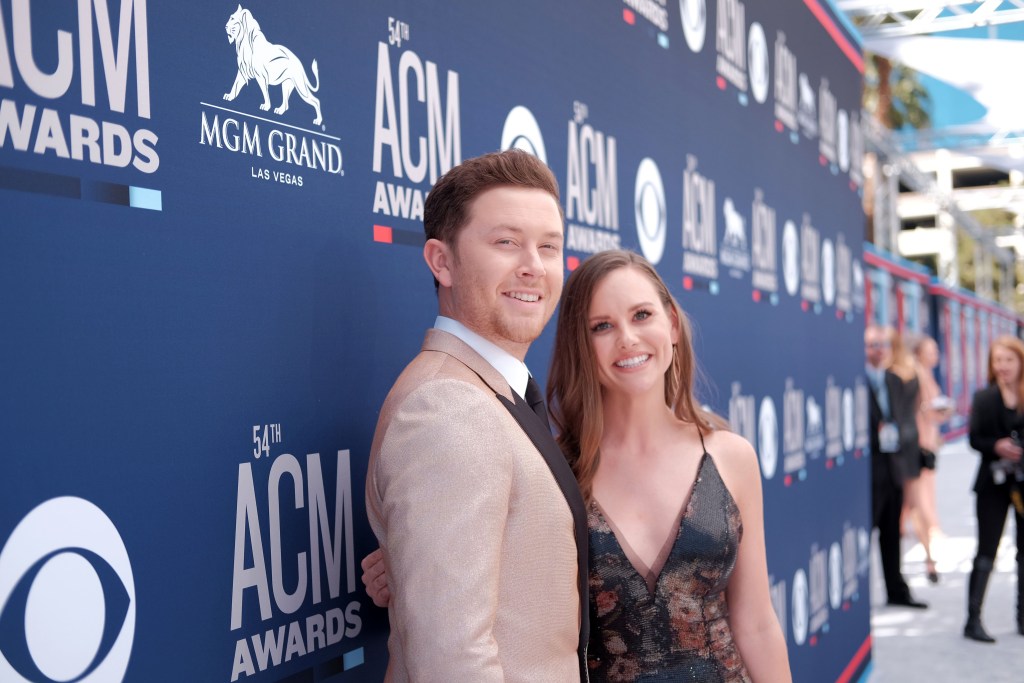 Scotty McCreery and his wife Gabi Dugal attend the 54th Academy Of Country Music Awards at MGM Grand Hotel & Casino on April 07, 2019 in Las Vegas, Nevada. 