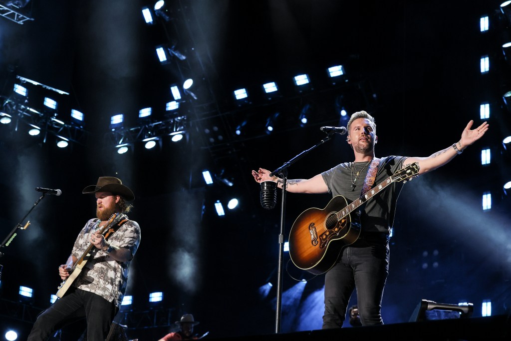 NASHVILLE, TENNESSEE - JUNE 11: (L-R) John Osborne and T.J. Osborne of Brothers Osborne perform during day 3 of CMA Fest 2022 at Nissan Stadium on June 11, 2022 in Nashville, Tennessee.
