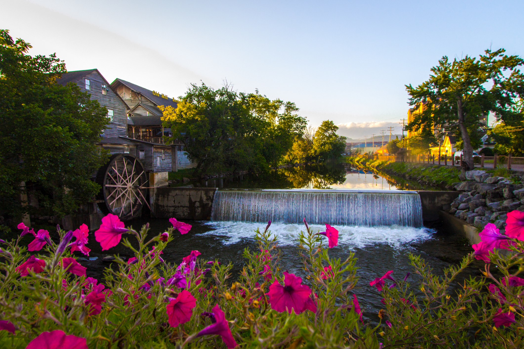 Waterfall and dam along the Little Pigeon River in the small mountain resort town of Pigeon Forge, Tennessee.