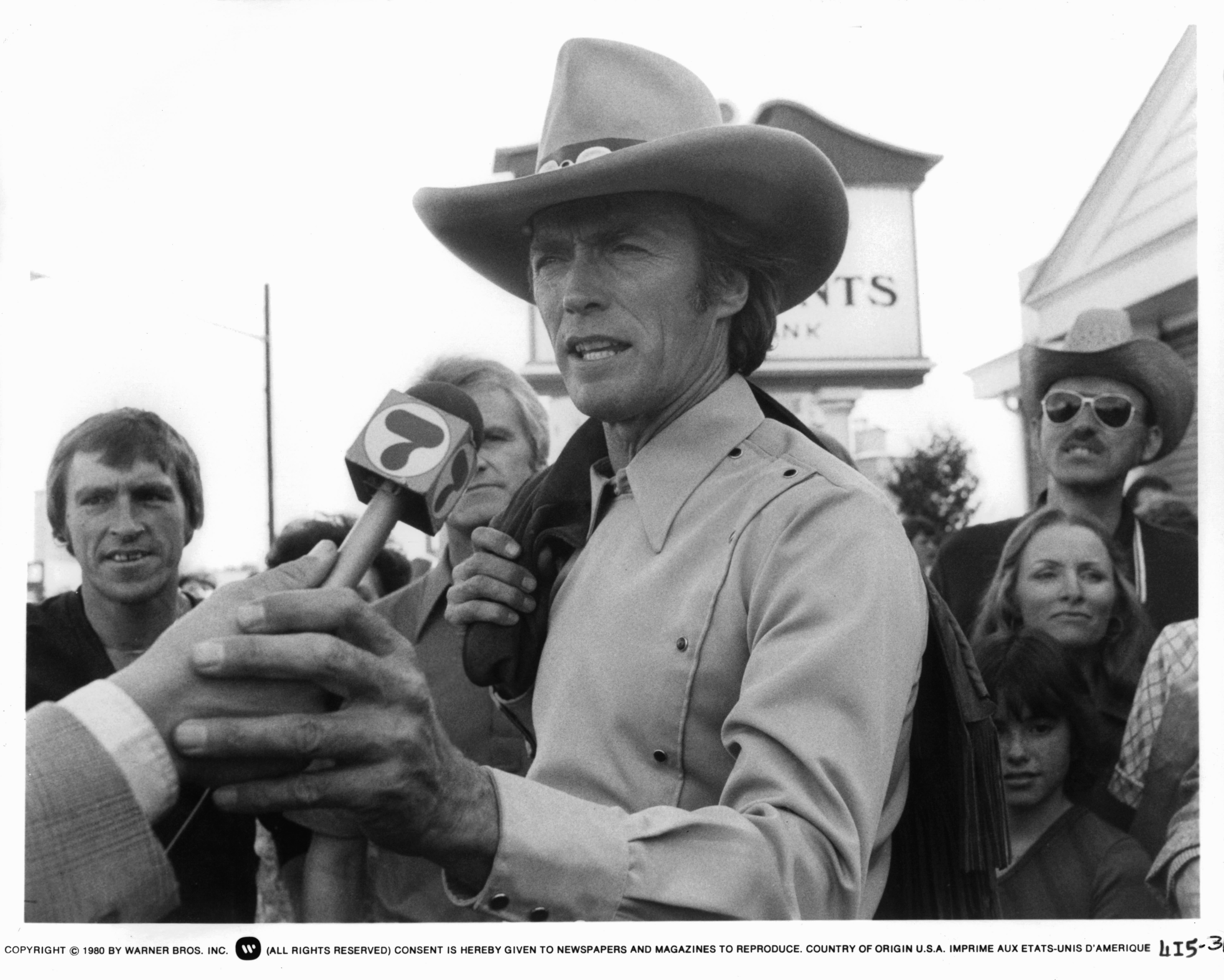 Clint Eastwood making a statement to channel 7 network in a scene from the film 'Bronco Billy', 1980. 