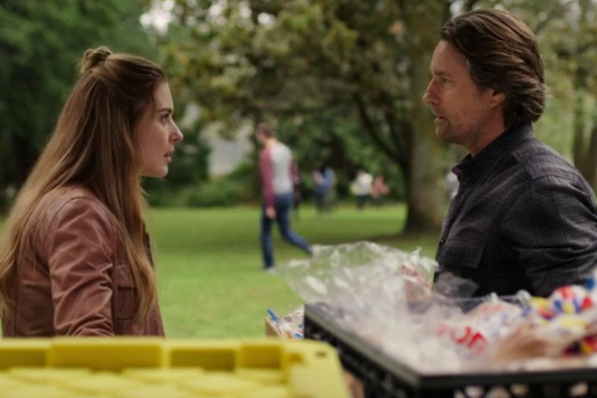 Scene from 'Virgin River' with Mel and Jack talking at an ourdoor picnic