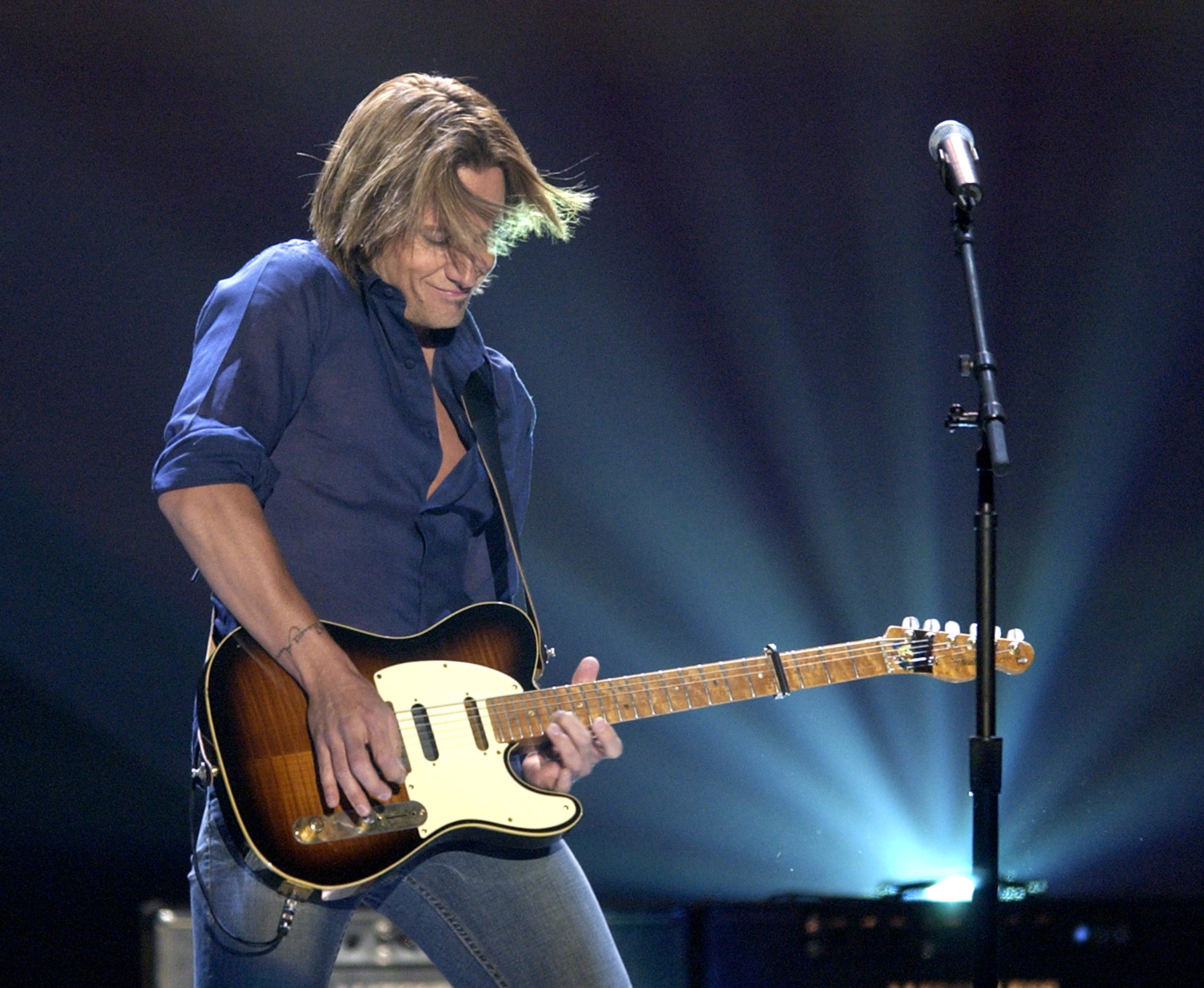 Keith Urban performs "Raining on Sunday" at the 38th Annual Academy of Country Music 
