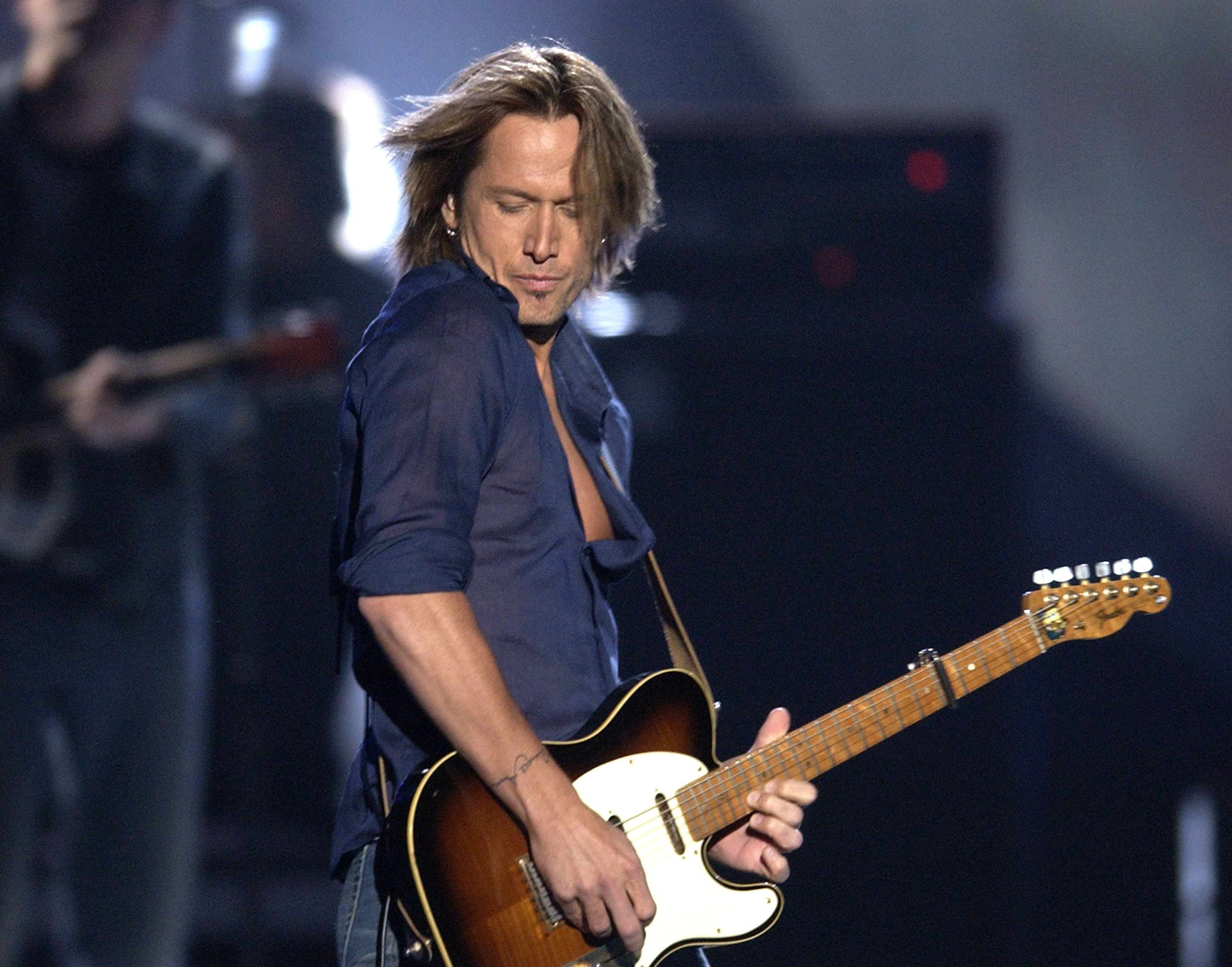 Keith Urban performs "Raining on Sunday" at the 38th Annual Academy of Country Music 