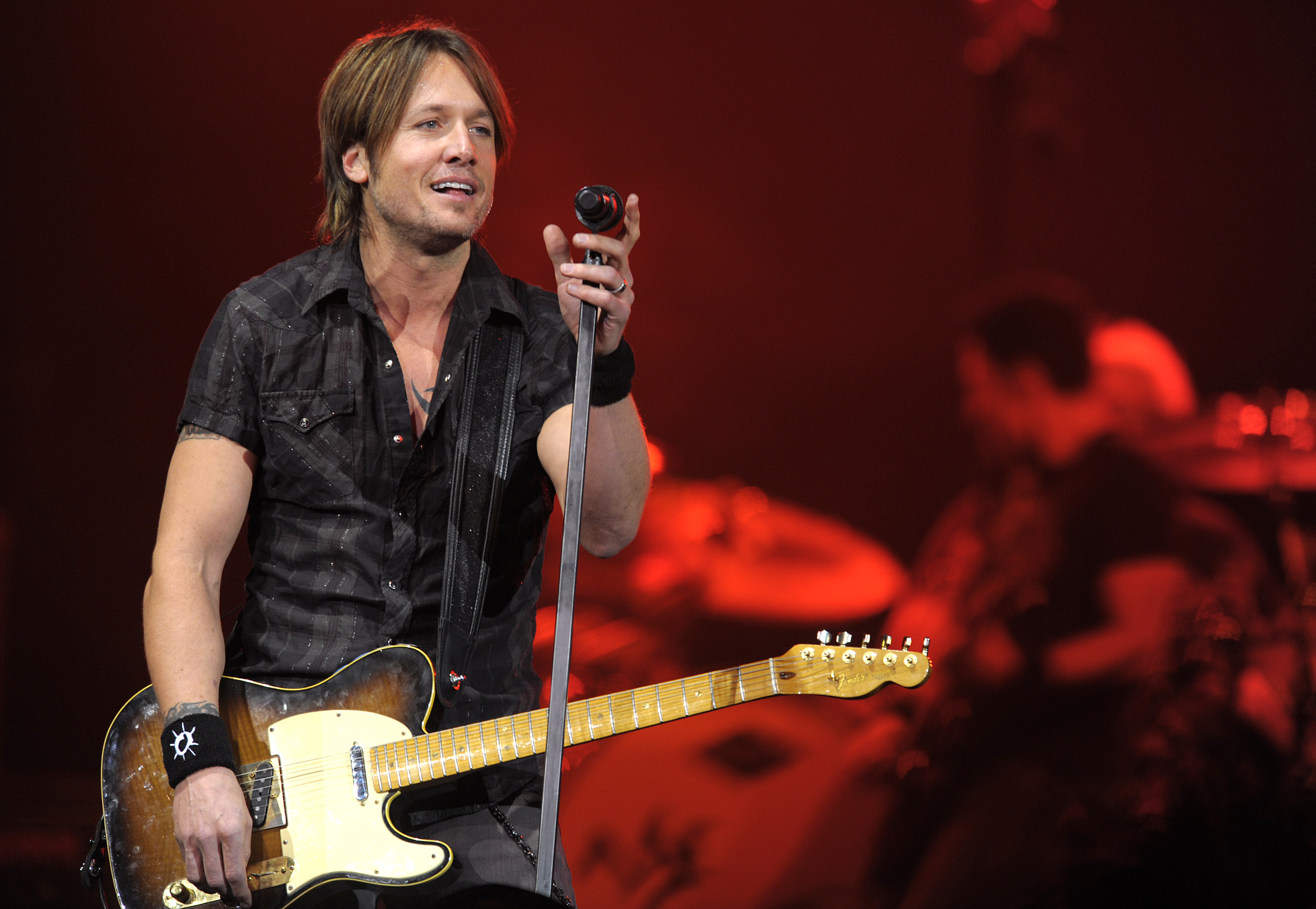 MELBOURNE, AUSTRALIA - DECEMBER 12: Keith Urban performs on stage at the Rod laver Arena on December 12, 2009 in Melbourne, Australia.