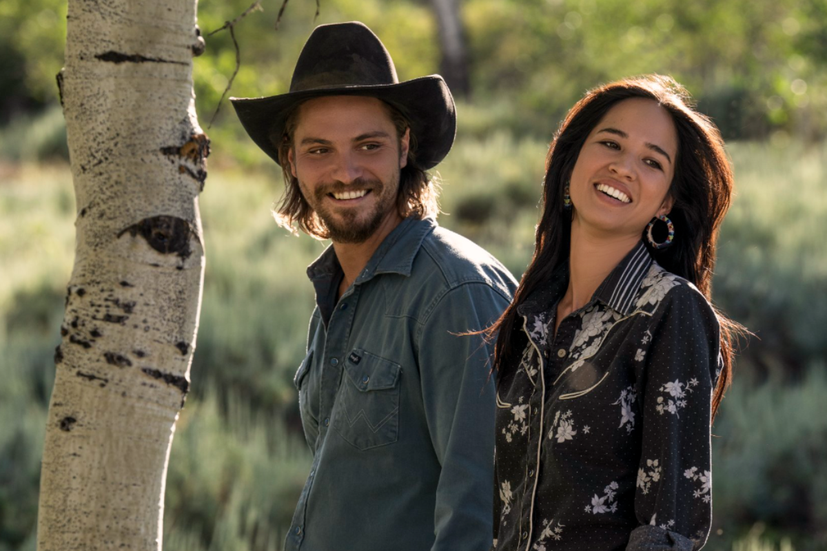 Luke Grimes as Kayce Dutton and Kelsey Asbille as Monica Dutton in scene from 'Yellowstone'