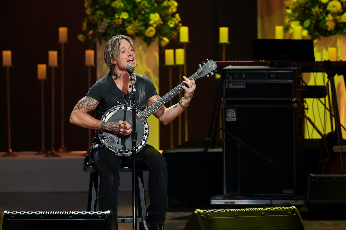 NASHVILLE, TENNESSEE - OCTOBER 30: Keith Urban performs onstage for CMT Coal Miner's Daughter: A Celebration of the Life & Music of Loretta Lynn at Grand Ole Opry on October 30, 2022 in Nashville, Tennessee.