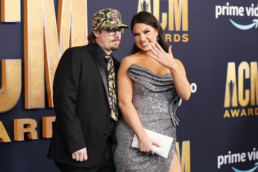 LAS VEGAS, NEVADA - MARCH 07: (L-R) HARDY and Caleigh Ryan attend the 57th Academy of Country Music Awards at Allegiant Stadium on March 07, 2022 in Las Vegas, Nevada.