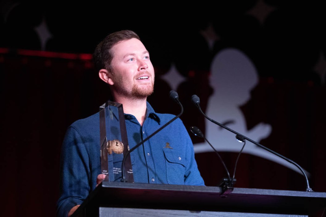 Press photo of Scotty McCreery (center) from the 2022 Country Cares Seminar.