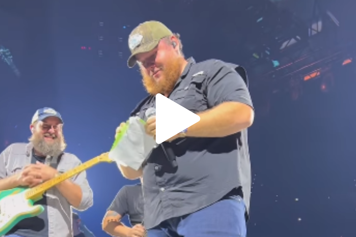 Screengrab of Luke Combs' Oct. 2022 gender reveal for a couple at a Louisville, Kent. tour stop.