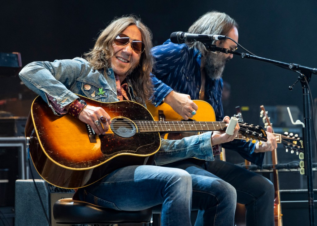 STERLING HEIGHTS, MICHIGAN - SEPTEMBER 09: Charlie Star (L) of Blackberry Smoke performs at Michigan Lottery Amphitheatre on September 09, 2022 in Sterling Heights, Michigan. 
