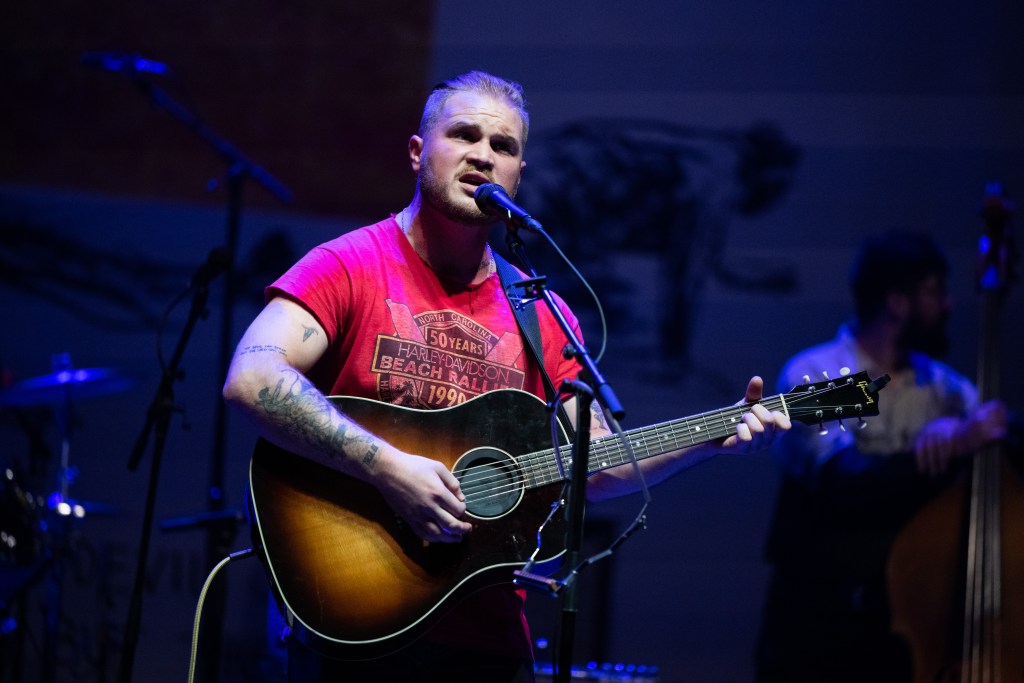 LOS ANGELES, CALIFORNIA - OCTOBER 18: Musician Zach Bryan performs onstage during the 'American Heartbreak' tour at The Wiltern on October 18, 2022 in Los Angeles, California.