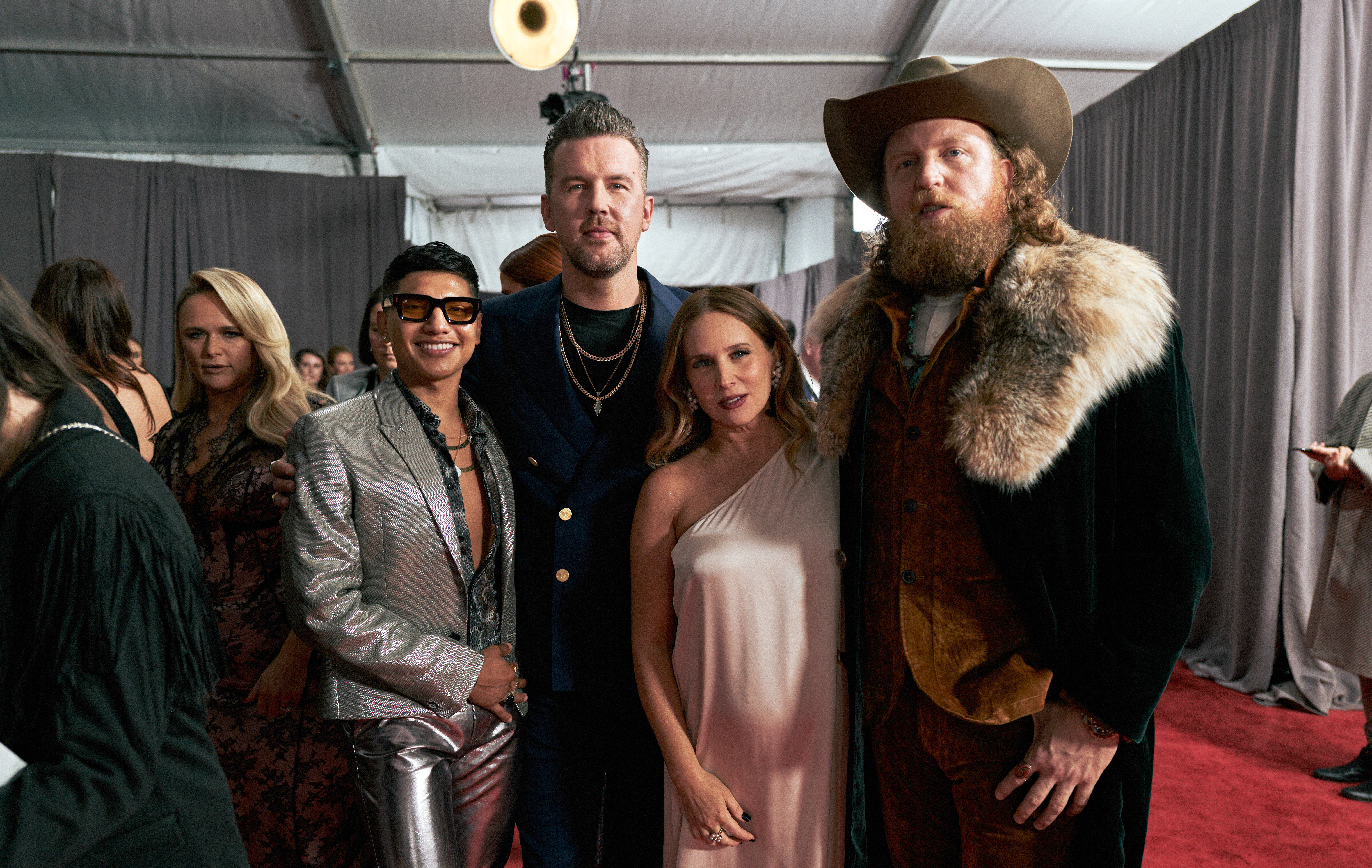 NASHVILLE, TENNESSEE - NOVEMBER 09: (L-R) Abi Ventura, T.J. Osborne of Brothers Osborne, Lucie Silvas and John Osborne of Brothers Osborne attend the 56th Annual Country Music Association Awards at Bridgestone Arena on November 09, 2022 in Nashville, Tennessee. 