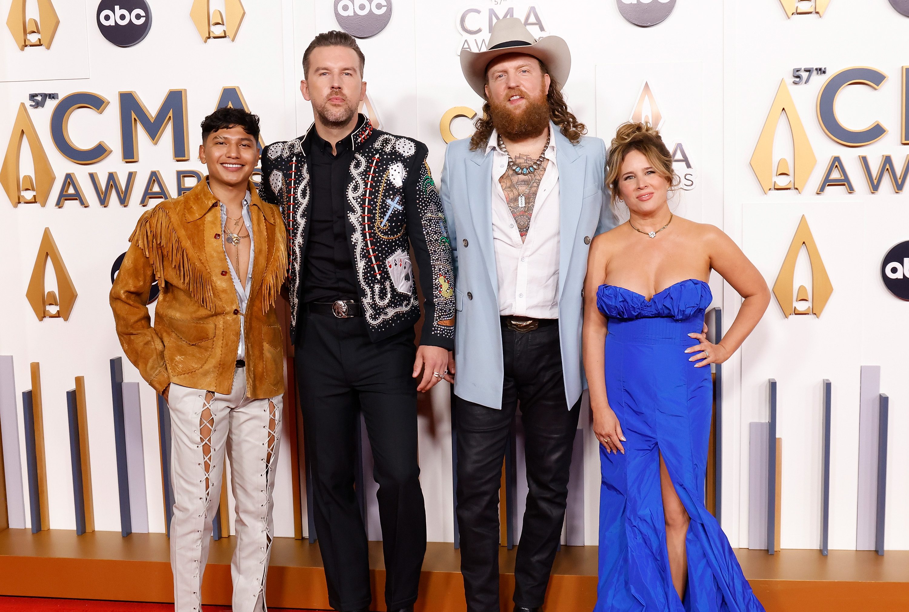 NASHVILLE, TENNESSEE - NOVEMBER 08: EDITORIAL USE ONLY: Abi Ventura, T.J. Osborne, Jingle John Osborne, and Lucie Silvas attend the 2023 CMA Awards at Bridgestone Arena on November 08, 2023 in Nashville.