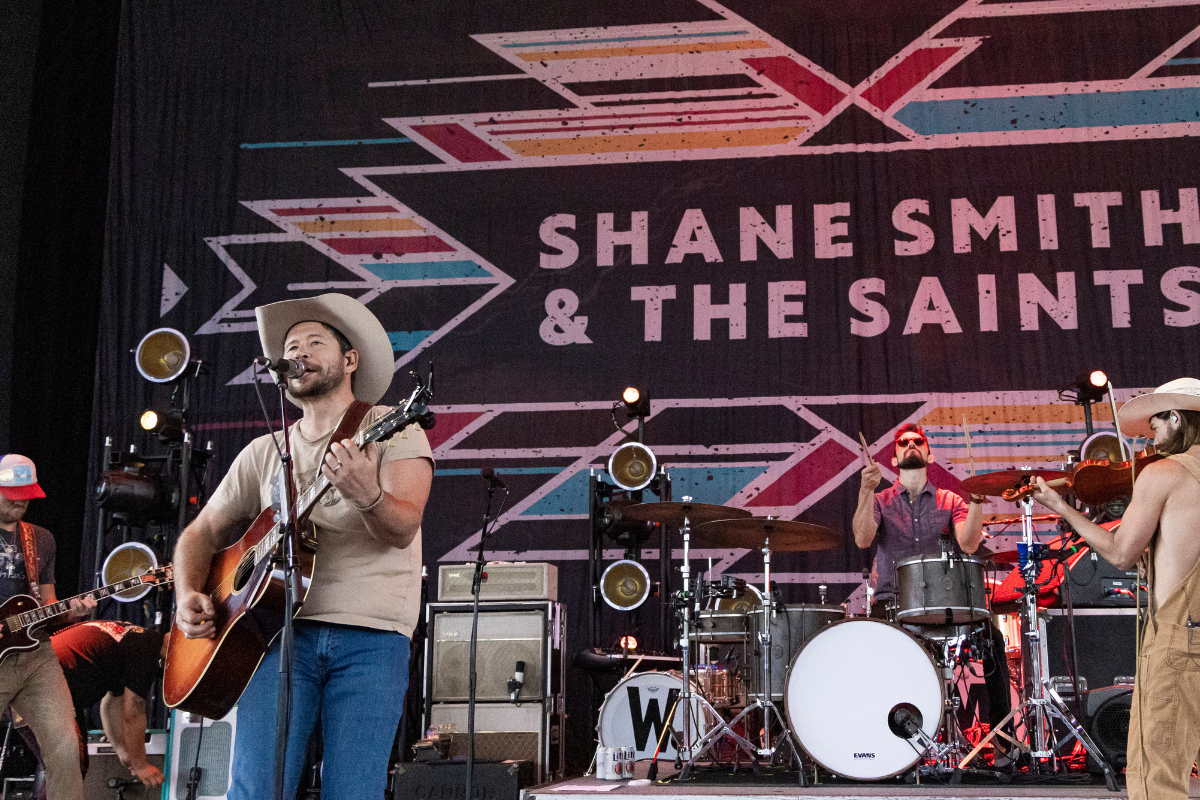 Shane Smith (C) of Shane Smith & the Saints performs at Michigan Lottery Amphitheatre on May 21, 2022 in Sterling Heights, Michigan.