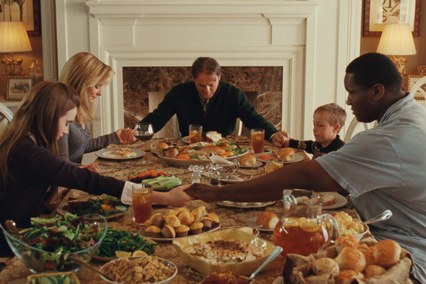 Sandra Bullock, Tim McGraw, Jae Head, Quinton Aaron, and Lily Collins in The Blind Side (2009)