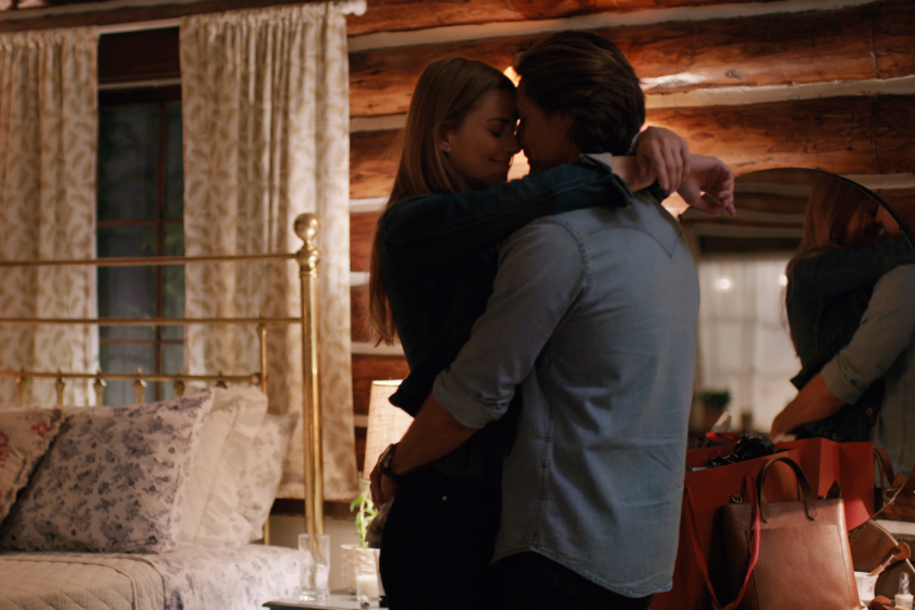 Jack and Mel in Mel's cabin in a scene from 'Virgin River'