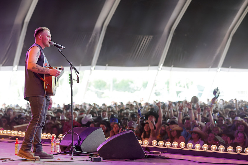 INDIO, CALIFORNIA - APRIL 30: Zach Bryan performs onstage during Day 2 of the 2022 Stagecoach Festival at the Empire Polo Field on April 30, 2022 in Indio, California. 