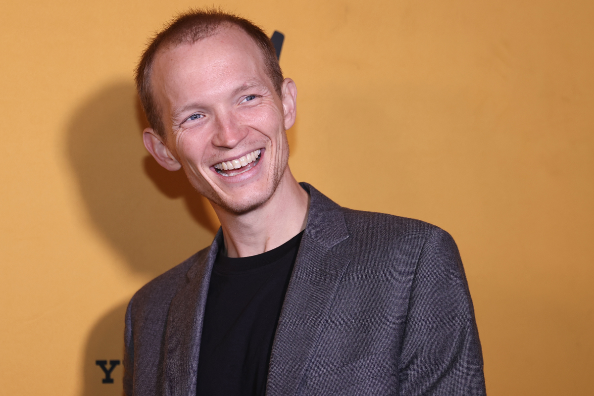 Jefferson White poses for picture at the black carpet during "Yellowstone" Season 5 Fort Worth Premiere at Hotel Drover on November 13, 2022 in Fort Worth, Texas.