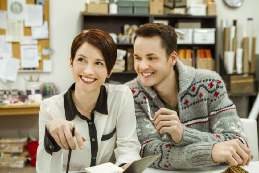 Chyler Leigh and Paul Campbell in 'Window Wonderland'