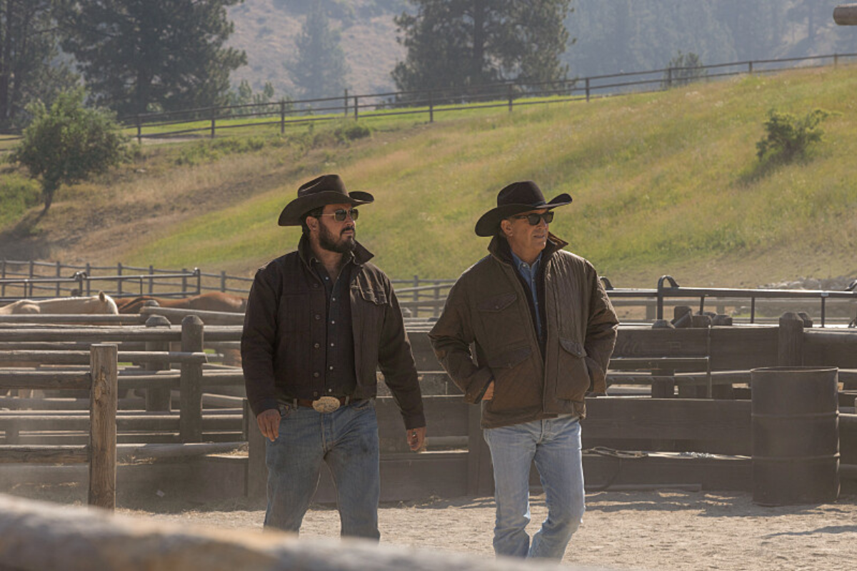 Rip and John in Yellowstone walking around the ranch