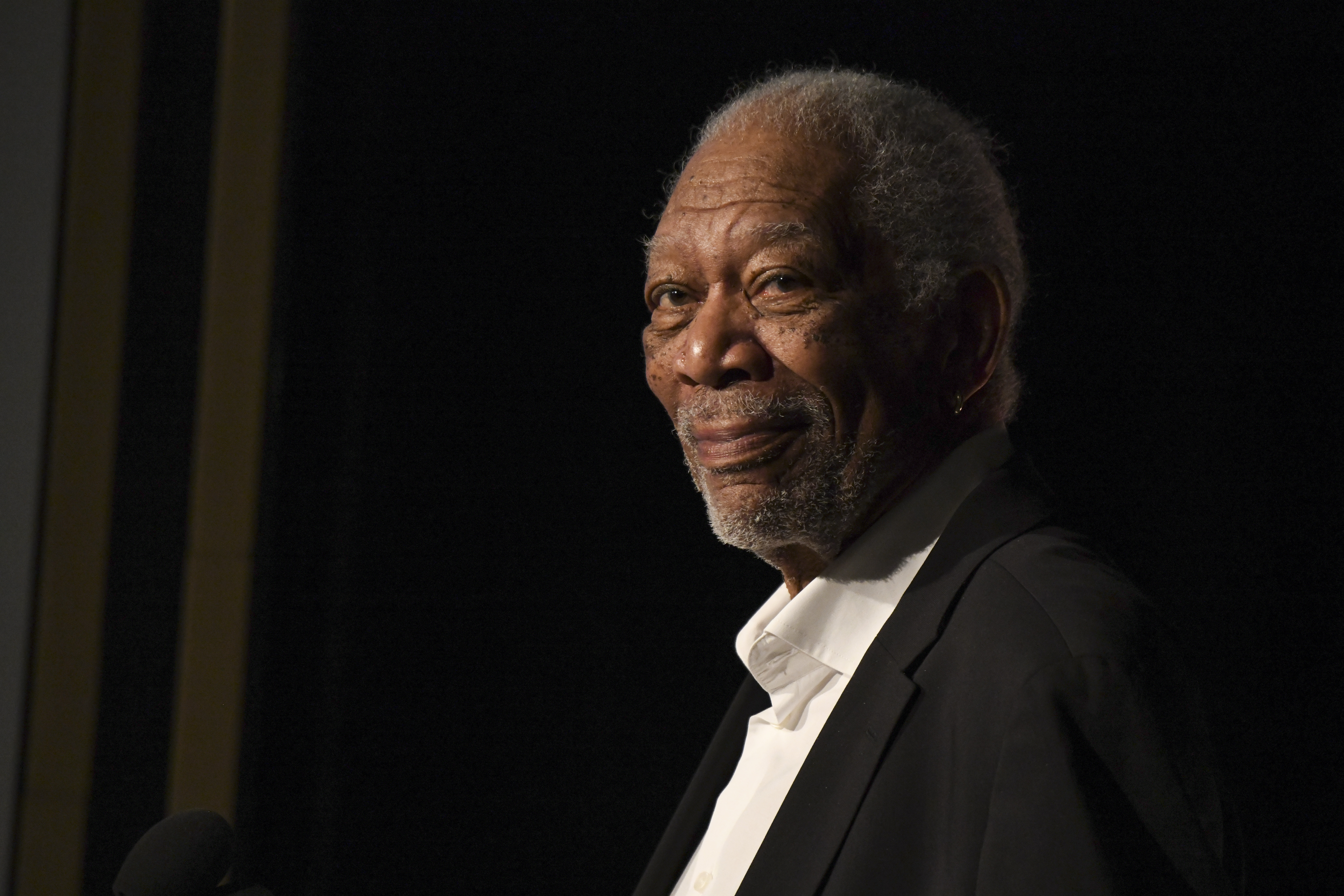 BEVERLY HILLS, CALIFORNIA - MARCH 11: Morgan Freeman presents onstage at the AFI Awards Luncheon at Beverly Wilshire, A Four Seasons Hotel on March 11, 2022 in Beverly Hills, California.