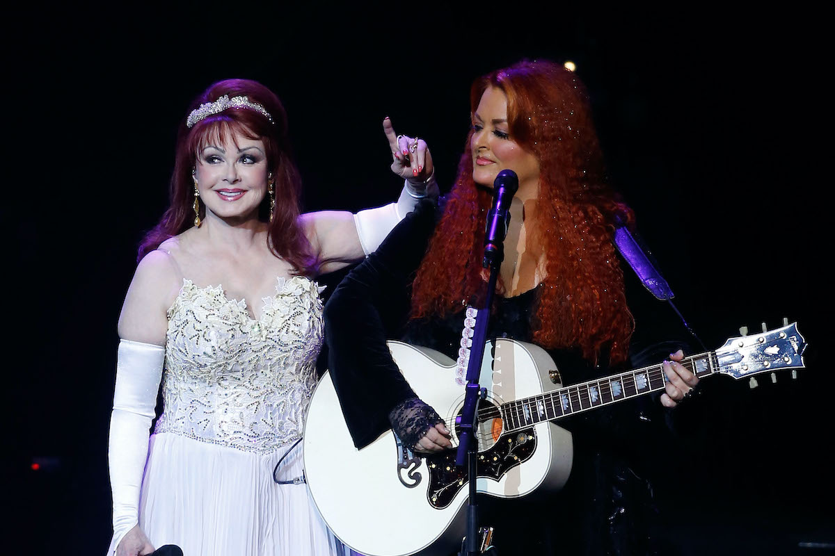LAS VEGAS, NV - OCTOBER 07: Recording artists Naomi Judd (L) and Wynonna Judd perform during the launch of their nine-show residency "Girls Night Out" at The Venetian Las Vegas on October 7, 2015 in Las Vegas, Nevada.