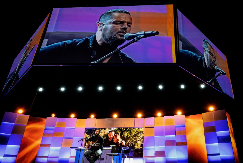 ONTARIO, CA - OCTOBER 06: ONTARIO, CA - OCTOBER 06: Apple Valleys Chayce Beckham, who won American Idol, in May performs The Beatles Blackbird, during the San Bernardino County State of the County held at the Toyota Arena in Ontario on Wednesday, Oct. 6, 2021.