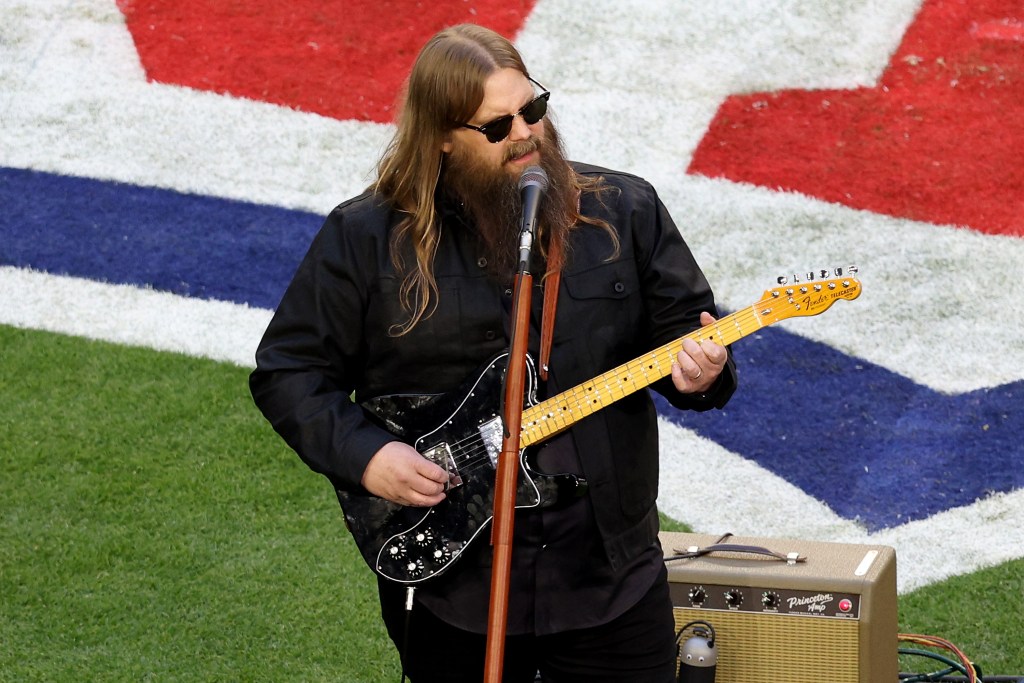 GLENDALE, ARIZONA - FEBRUARY 12: Chris Stapleton performs the national anthem before Super Bowl LVII between the Kansas City Chiefs and the Philadelphia Eagles at State Farm Stadium on February 12, 2023 in Glendale, Arizona. (