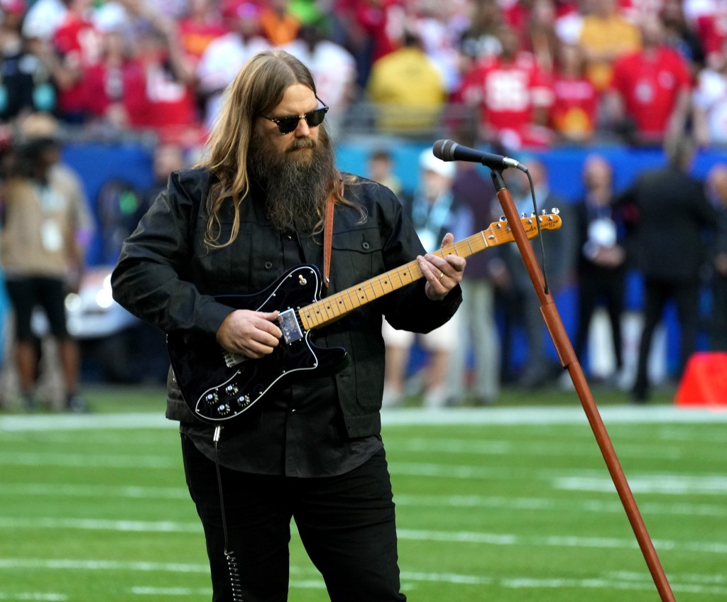 GLENDALE, ARIZONA - FEBRUARY 12: Chris Stapleton performs the national anthem during Super Bowl LVII at State Farm Stadium on February 12, 2023 in Glendale, Arizona.
