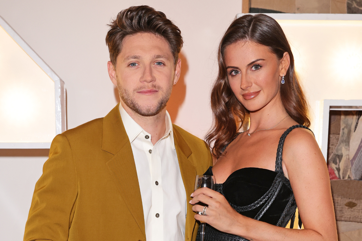 WATFORD, ENGLAND - SEPTEMBER 03: Niall Horan and Mia Woolley attend the Horan & Rose Show: Modest! Golf co-founder Niall Horan and Justin Rose brought the world of music and sport together at The Grove, presenting an evening of entertainment to raise money for The Black Heart Foundation on September 03, 2021 in Watford, England.