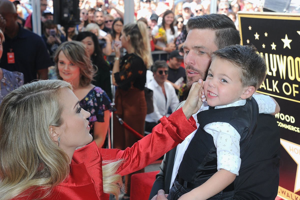HOLLYWOOD, CA - SEPTEMBER 20: Musician Carrie Underwood, husband Mike Fisher and son Isaiah Michael Fisher at Carrie Underwood Star Ceremony On The Hollywood Walk Of Fame held on September 20, 2018 in Hollywood, California.