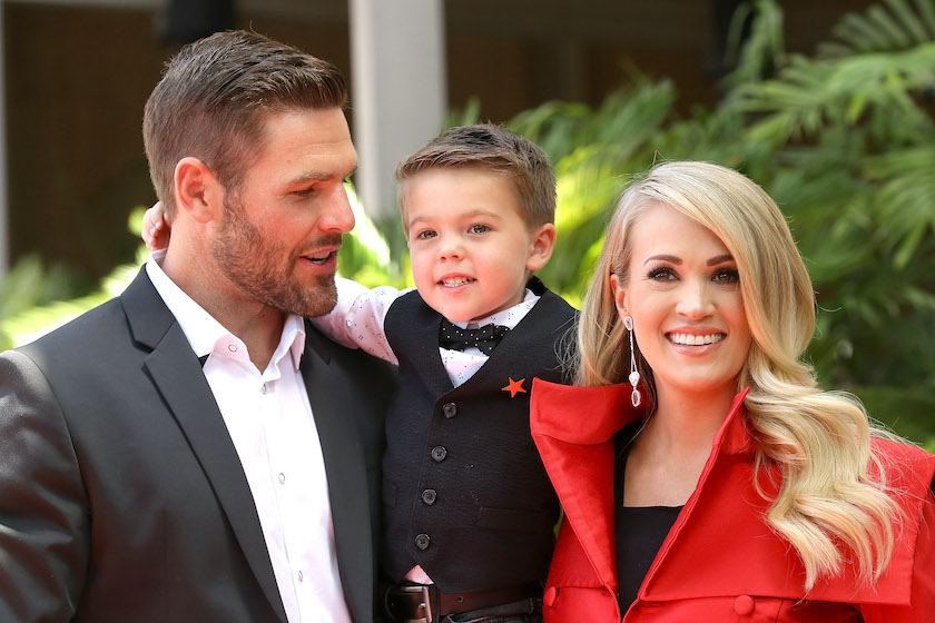 HOLLYWOOD, CA - SEPTEMBER 20: Carrie Underwood with her husband, Mike Fisher and their son, Isaiah Michael Fisher attend the ceremony honoring Carrie Underwood with a Star on The Hollywood Walk of Fame held on September 20, 2018 in Hollywood, California. 