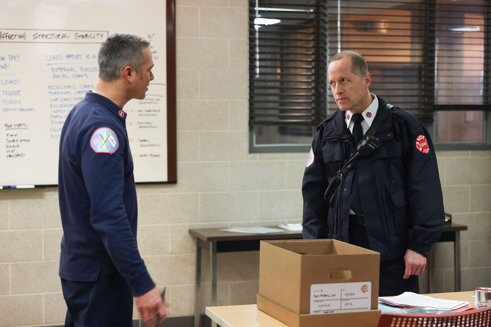 CHICAGO FIRE -- "The Man of the Moment" Episode 1113 -- Pictured: (l-r) Taylor Kinney as Kelly Severide, Tim Hopper as Van Meter --