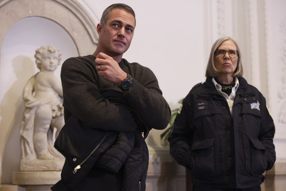 CHICAGO FIRE -- "Run Like Hell" Episode 1114 -- Pictured: (l-r) Taylor Kinney as Kelly Severide, Amy Morton as Trudy --