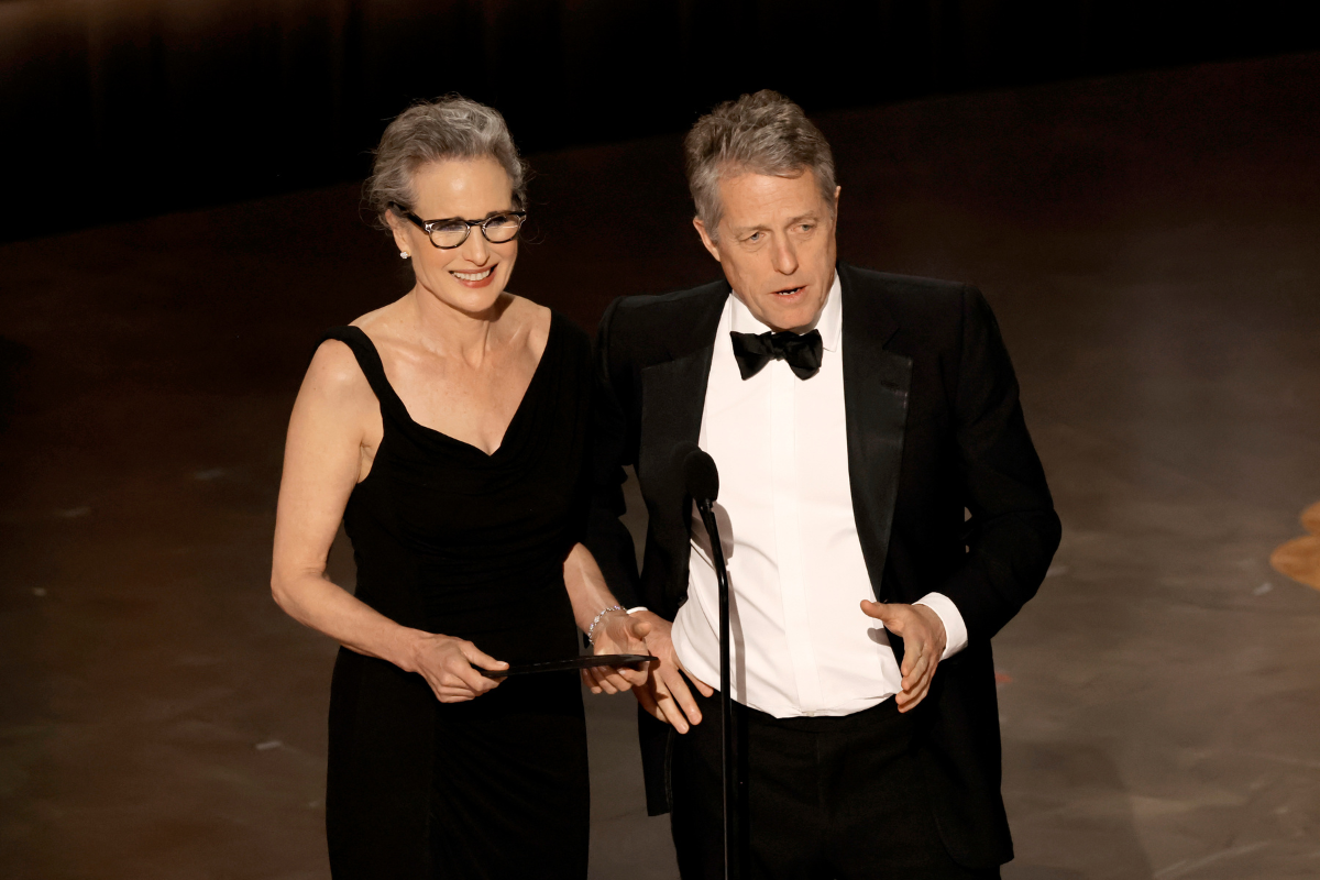 Andie MacDowell and Hugh Grant speaks onstage during the 95th Annual Academy Awards at Dolby Theatre on March 12, 2023 in Hollywood, California