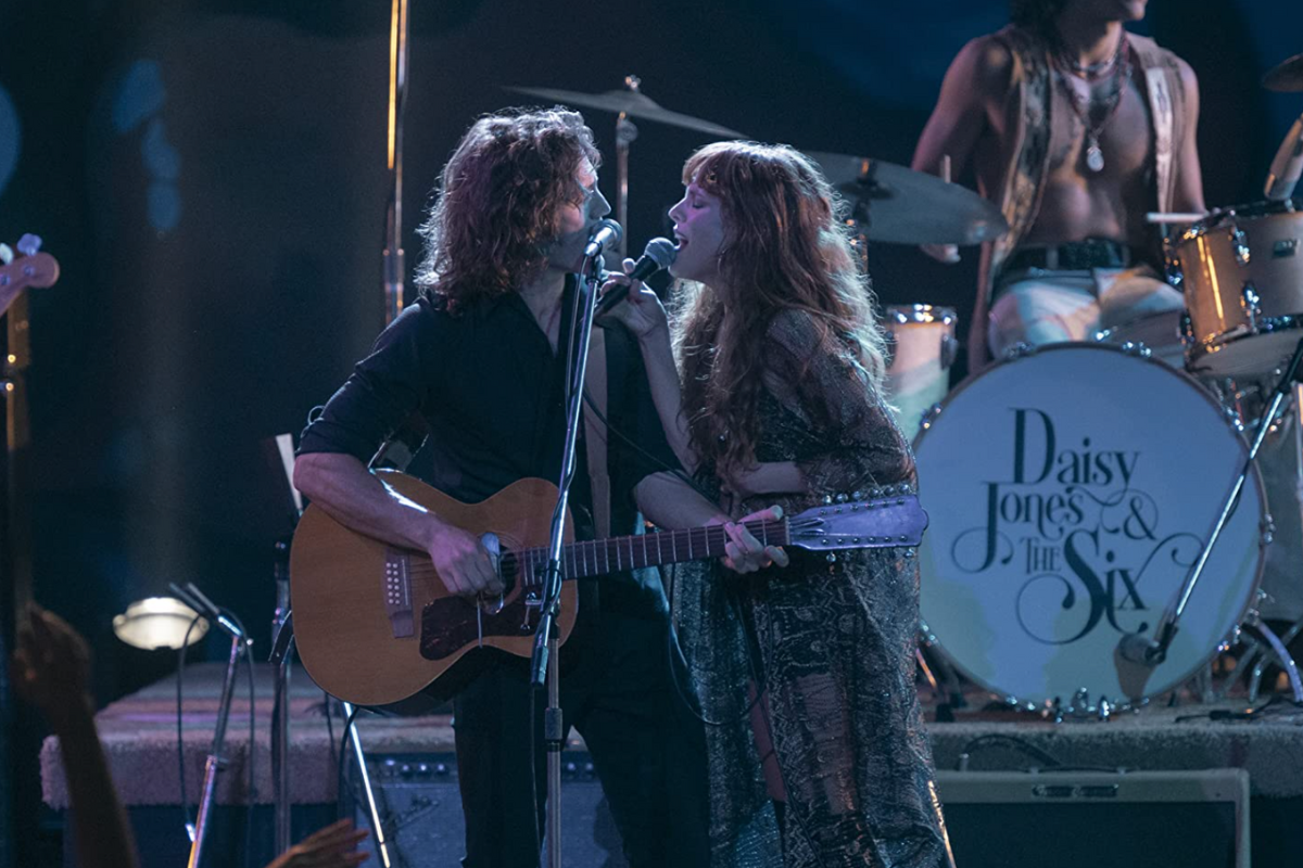 Riley Keough and Sam Claflin in Daisy Jones & The Six (2023)