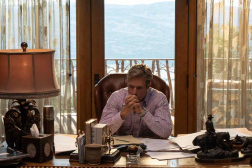Shaun Sipos (Luke Tillerson) sits at a desk looking pensive on 'Outer Range'