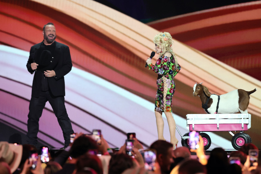 FRISCO, TEXAS - MAY 11: (L-R) Co-host Garth Brooks and Dolly Parton speak onstage during the 58th Academy Of Country Music Awards at The Ford Center at The Star on May 11, 2023 in Frisco, Texas.