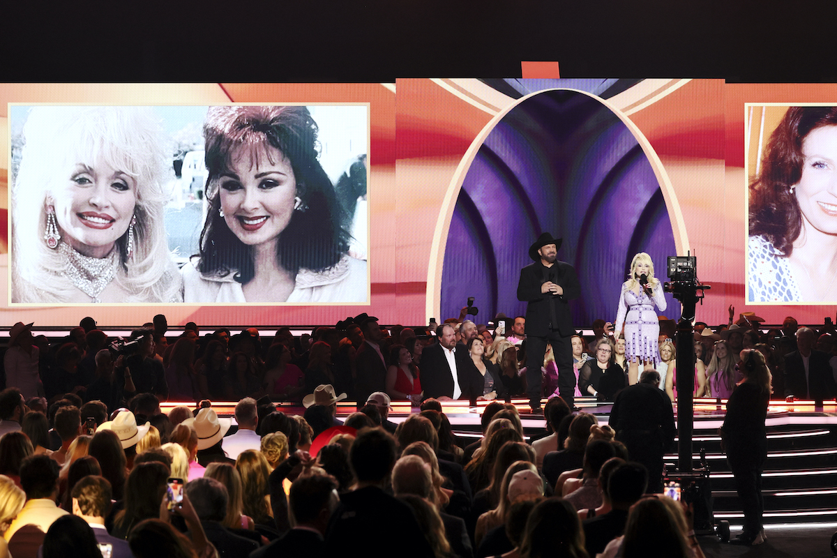 FRISCO, TEXAS - MAY 11: (L-R) Co-hosts Garth Brooks and Dolly Parton speak onstage during the 58th Academy Of Country Music Awards at The Ford Center at The Star on May 11, 2023 in Frisco, Texas.